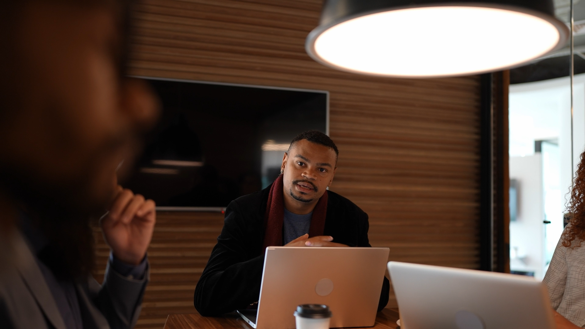 Marketing professional leading a meeting