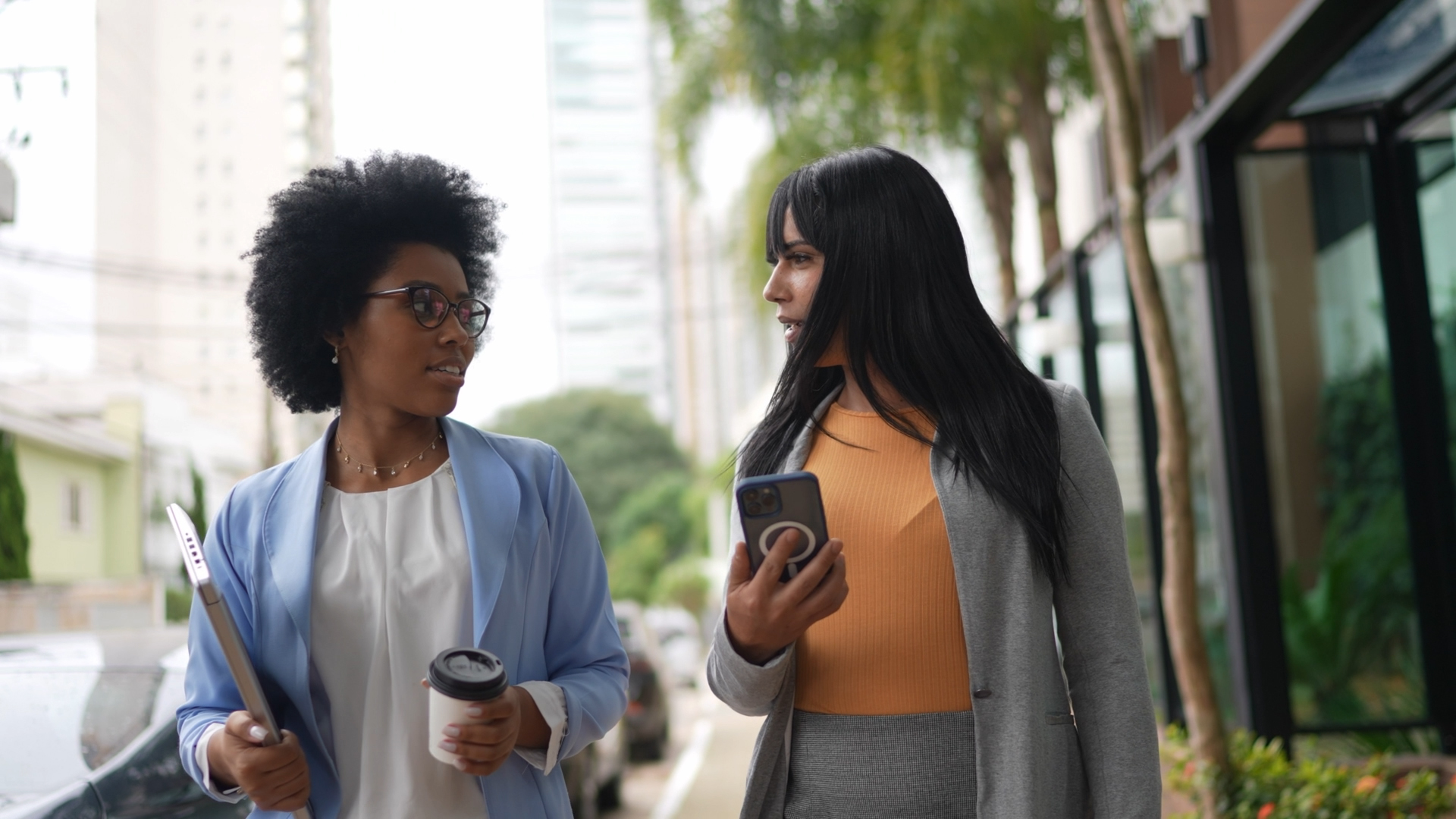 Female co-workers working together